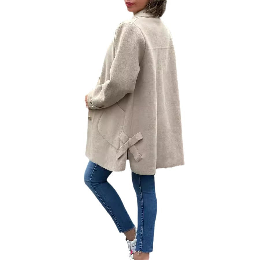 MAONA | OVERSIZED COAT WITH BOW DETAILS