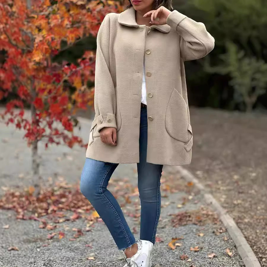 MAONA | OVERSIZED COAT WITH BOW DETAILS